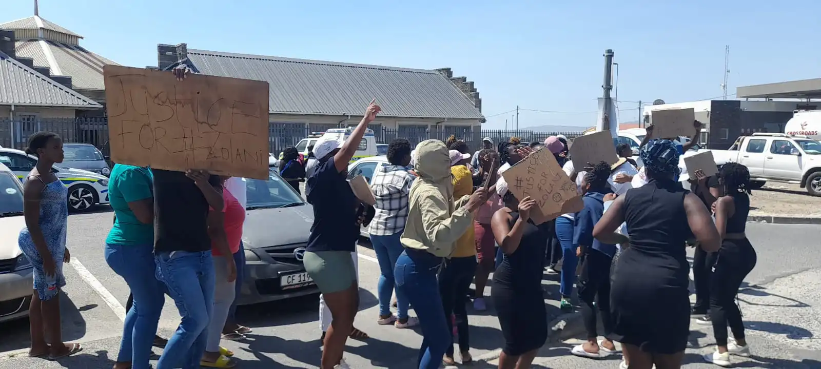 A group of people went to the police station to demand justice for Zolani who was allegedly stabbed by three girls. 