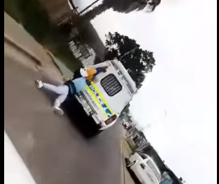 Why suspect was dragged at the back of the van?