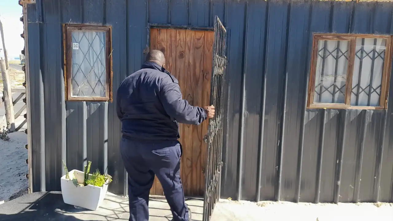 Body of a woman with stab wounds found inside a locked shack