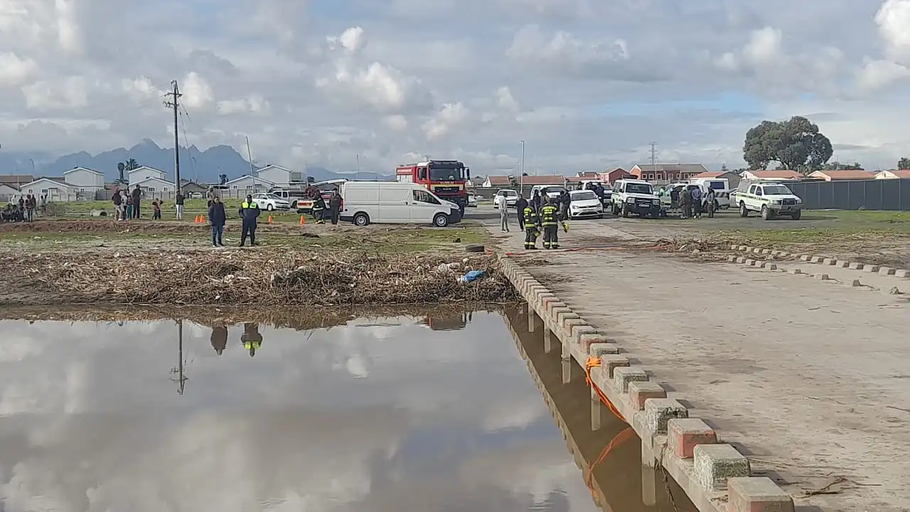 Residents search after man washed away by floods